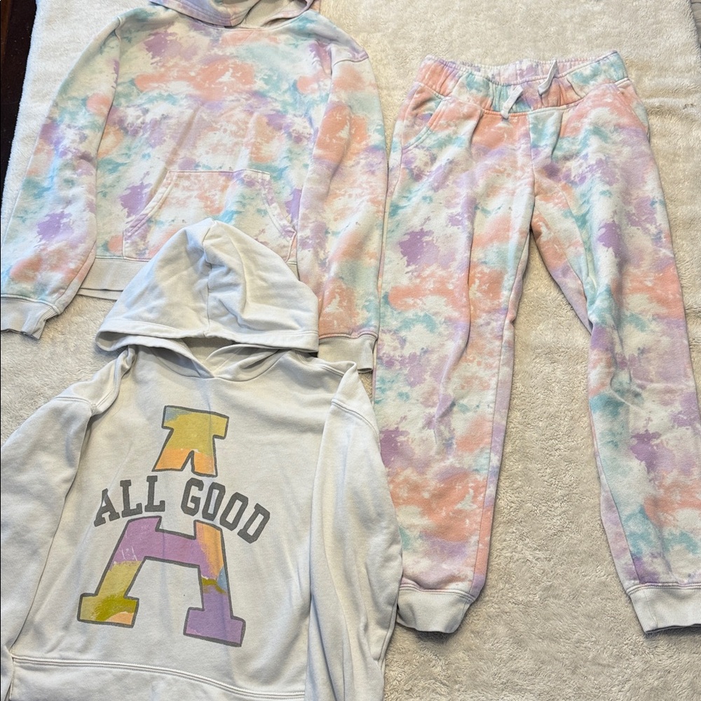Size 10/12 sweaters, dresses, pants (lot as shown)